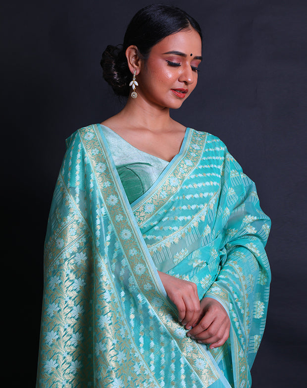 The sea green kora cotton saree with intricate thread and zari motifs sounds elegant,- BSK010529