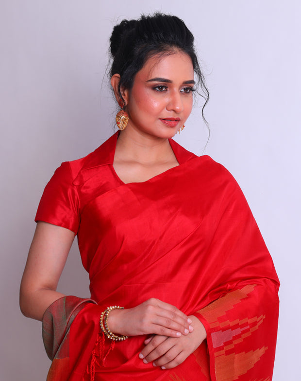 A Red Soft South Silk saree with a gold and silver Zari temple border and red tassels sounds exquisite - KSL02869