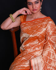 The orange Banarasi tissue saree with thread woven all over the drape,- BSK010772