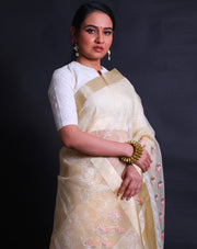 The light yellow organza saree with machine embroidery in white flower design all over the drape,- BLN01555