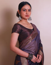 The dark mauve Banarasi cotton saree with a zari border and pallu sounds absolutely elegant. - BSK010739