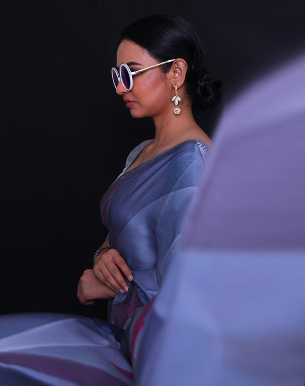 The grey blended satin crepe saree with different colors in digital modern print and stone embroidery all over the drape,- BLN01368