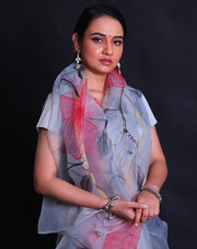 The grey blended organza saree with handprint in a colorful way, along with gold lines hand-printed in a modern attire,- BLN01279