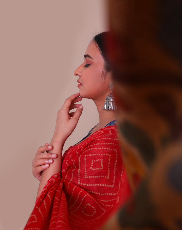 The red blended saree with bandini design printed all over and Shibori print on the border. - BLN00932