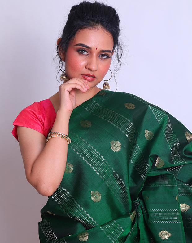 The bottle green Kanjivaram Soft South Silk saree sounds absolutely exquisite - KSL03087