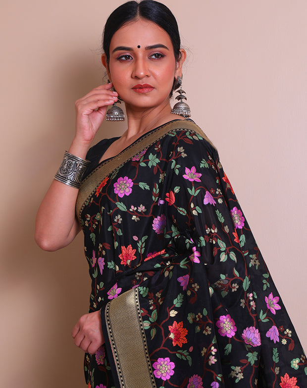 The black Banarsi Handloom silk saree with a gold zari border and pallu - BSK010542