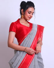 A White Cotton Saree with a checks design all over the drape offers a classic and timeless look - FCT011149