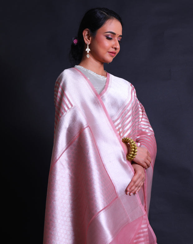 The Peach Banarasi Kora saree with silver lines woven horizontally all over the drape,- BSK010582