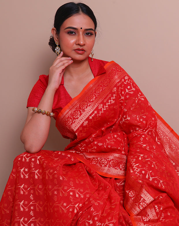 The red Banarsi cotton Handloom saree with gold zari details on the border, pallu, - BSK010593