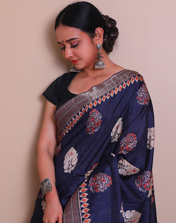 The dark blue semi-Tussar saree with batik print and mirror work all over the drape - BLN01343