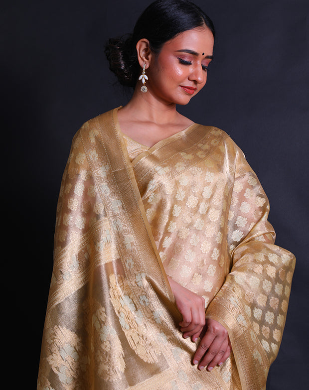 The gold cotton saree you've described sounds elegant and luxurious,- FCT011109