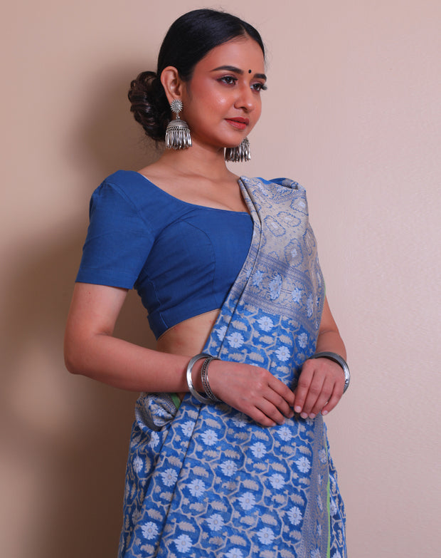 The blue cotton Handloom saree you described sounds charming and elegant. - BSK010565