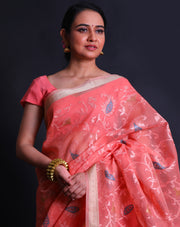 The peach fancy cotton saree with machine thread embroidery all over the drape sounds elegant and chic.- FCT011112