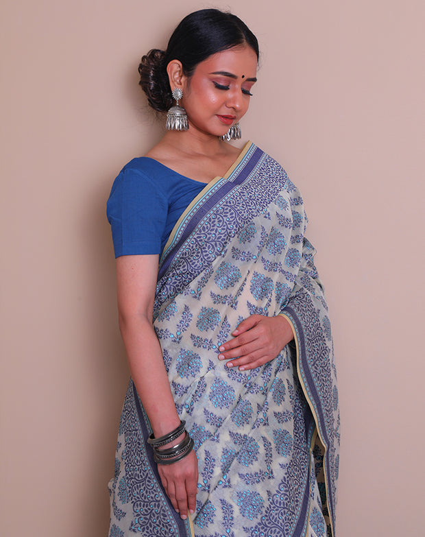 The beige cotton handloom saree with light blue and dark blue thread woven throughout sounds absolutely lovely - BSK010773