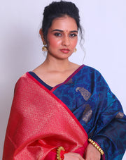 The Navy Blue South Silk Handloom saree with lighter blue woven all over the drape sounds elegant and sophisticated - KSL03152