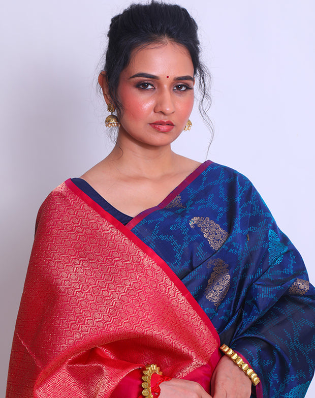 The Navy Blue South Silk Handloom saree with lighter blue woven all over the drape sounds elegant and sophisticated - KSL03152